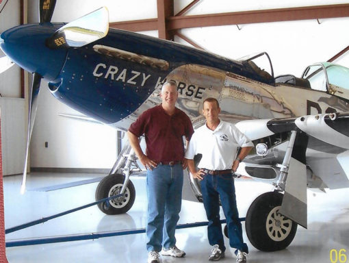 Author DB Lawhon prepares to fly in a Mustang fighter plane for birthday